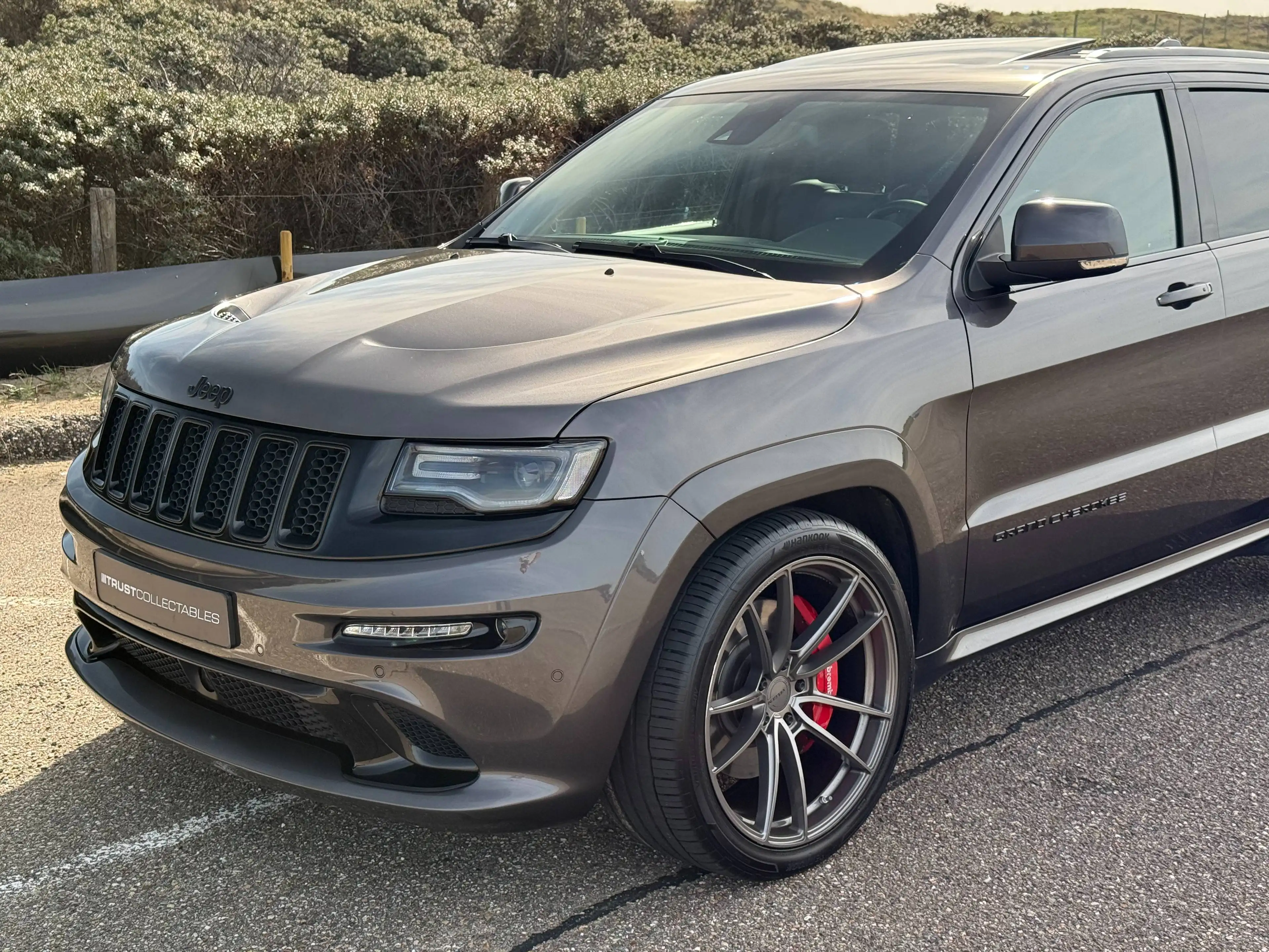 Jeep Grand Cherokee 6.4 Hemi SRT | Carbon | Trekhaak | Pano | Harman Kardon | 1e lak | 22" | — photo 4