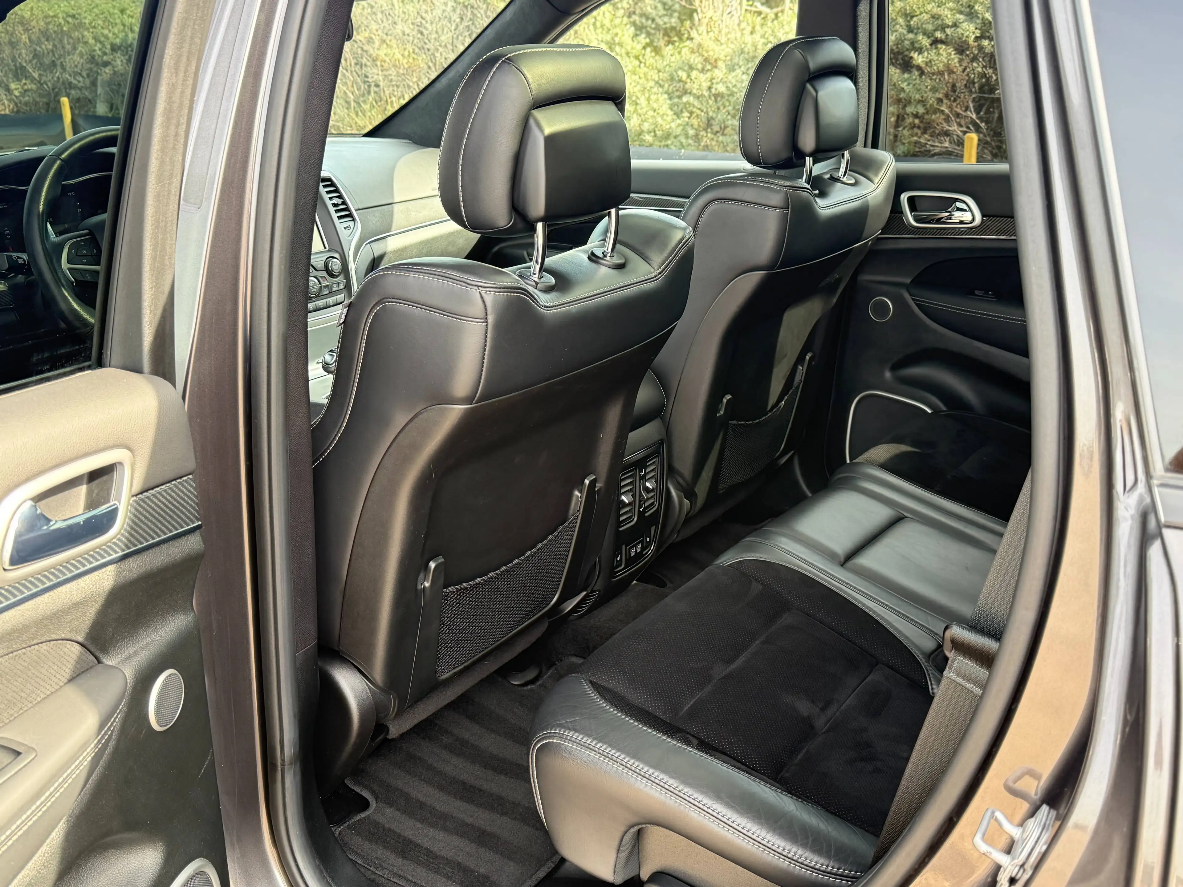 Jeep Grand Cherokee 6.4 Hemi SRT | Carbon | Trekhaak | Pano | Harman Kardon | 1e lak | 22" | — photo 9