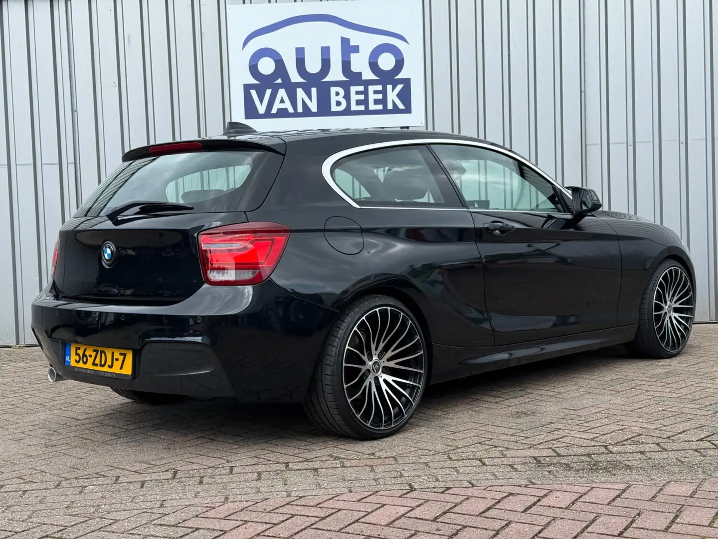 BMW 114 1-serie 114i Business+|Sensoren|Rijklaar Zwart - 2