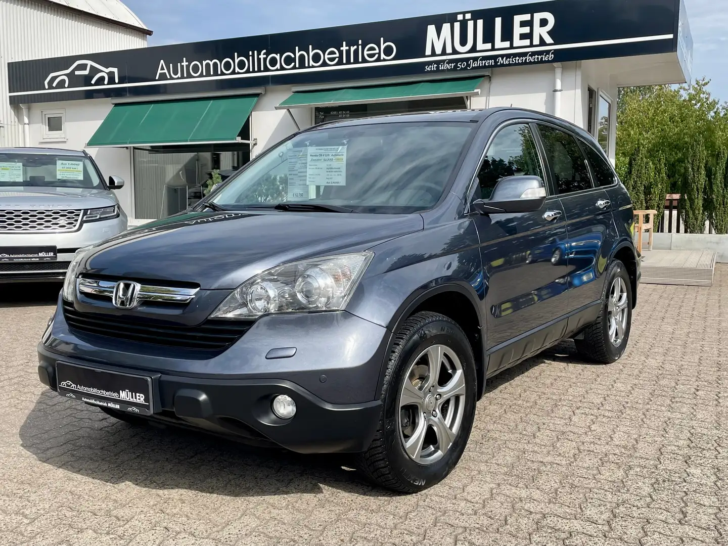 Honda CR-V 2.0i-Excl.AUTOM."ALLRAD"+LEDER+KAMERA+Xenon+NAVI Grau - 1