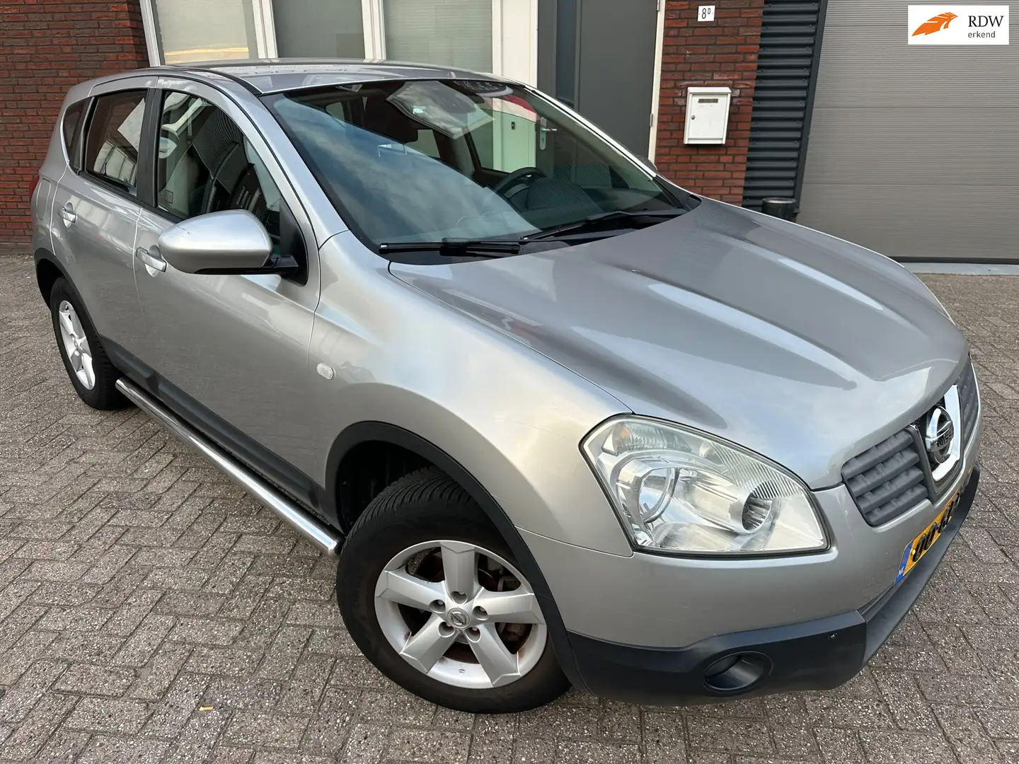 Nissan Qashqai 2.0 Tekna / PDC / Clima / LM / NAP Grijs - 1