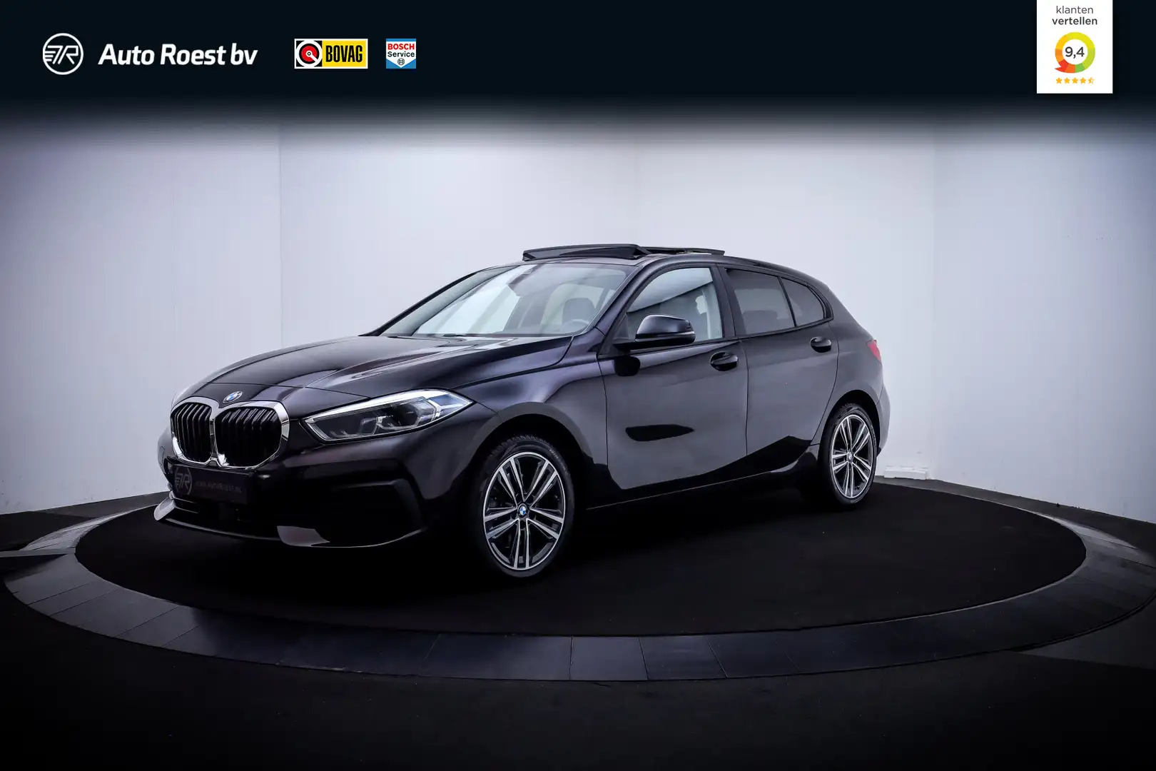 BMW 118 1-serie 118i Executive Edition PANO | FULL LED | L Noir - 1