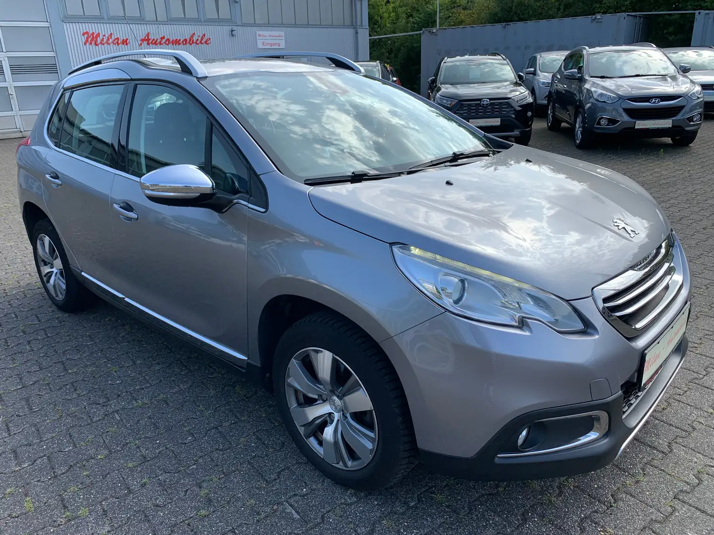 Peugeot 2008 Allure Automatik-Leder-SHZG-ALU-PDC-R.Kamera-Navi Grau - 1