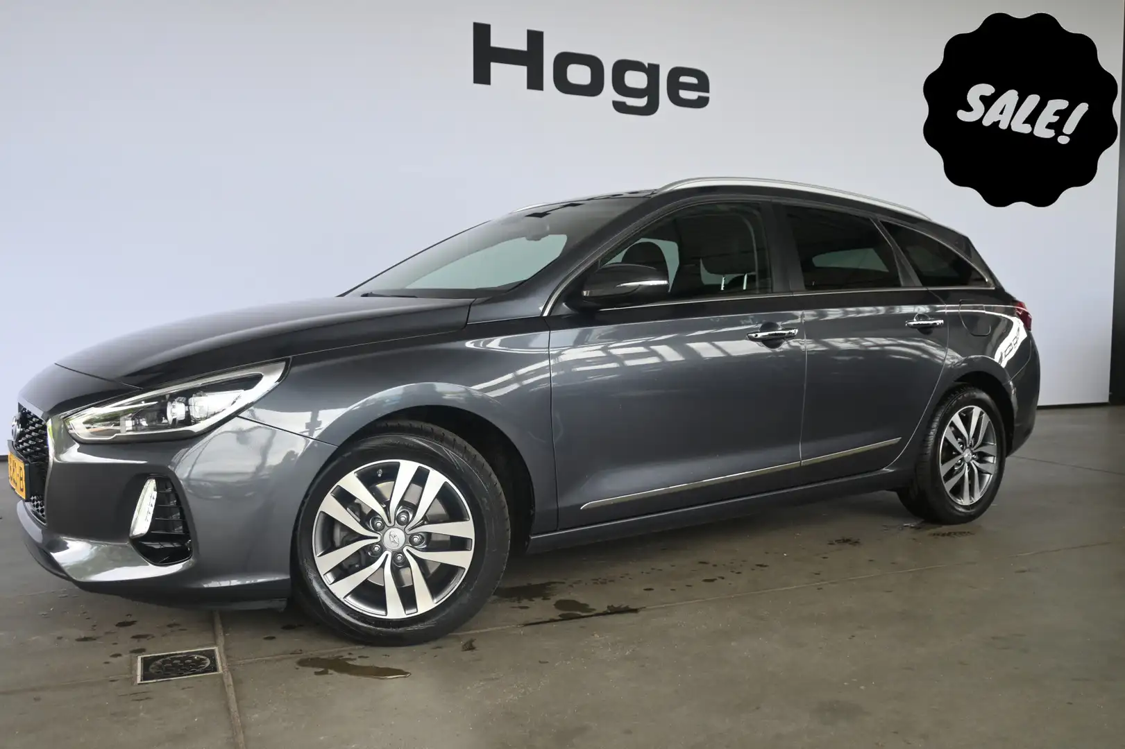 Hyundai i30 Wagon 1.4 T-GDI Premium Clima Cruise Control Navig Grijs - 1