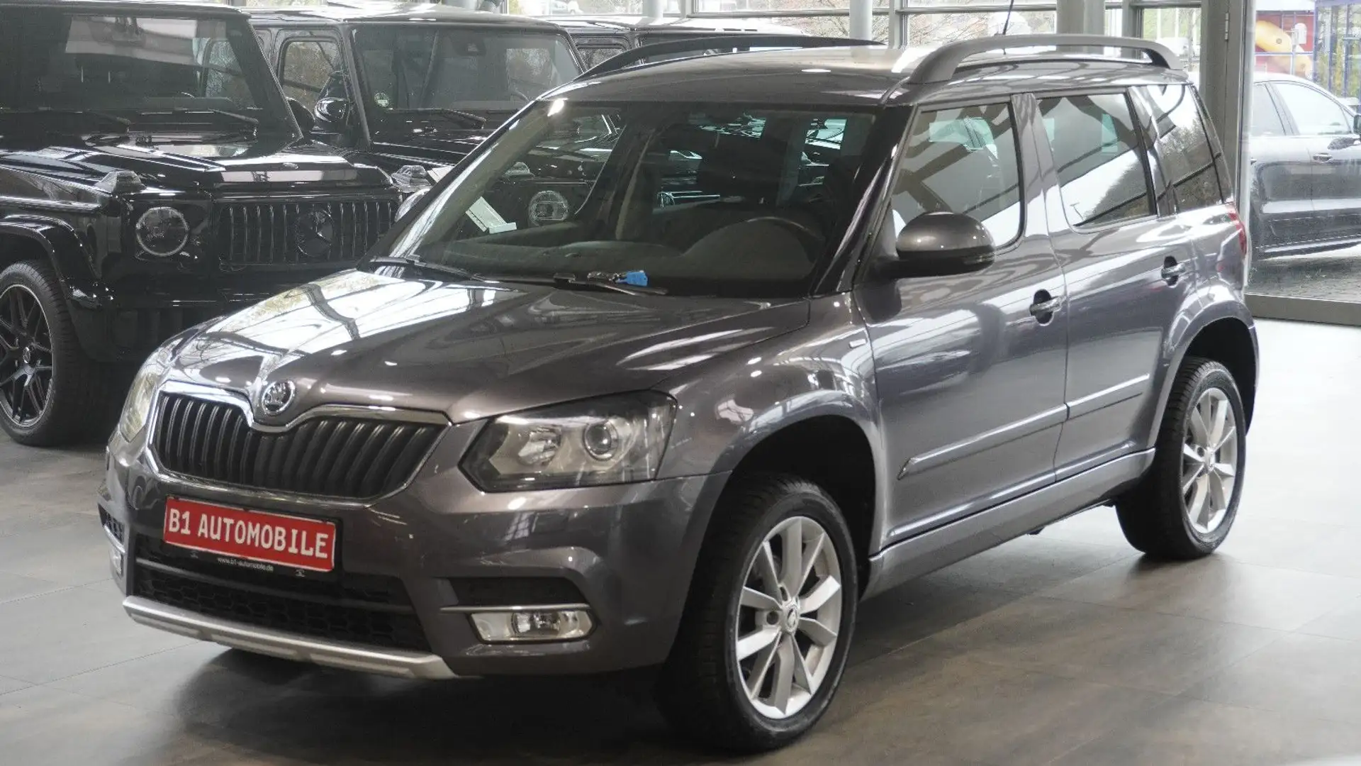 Skoda Yeti Drive 4x4*AHK*NAVI*DAB*SOUND*1-HAND* Grau - 1