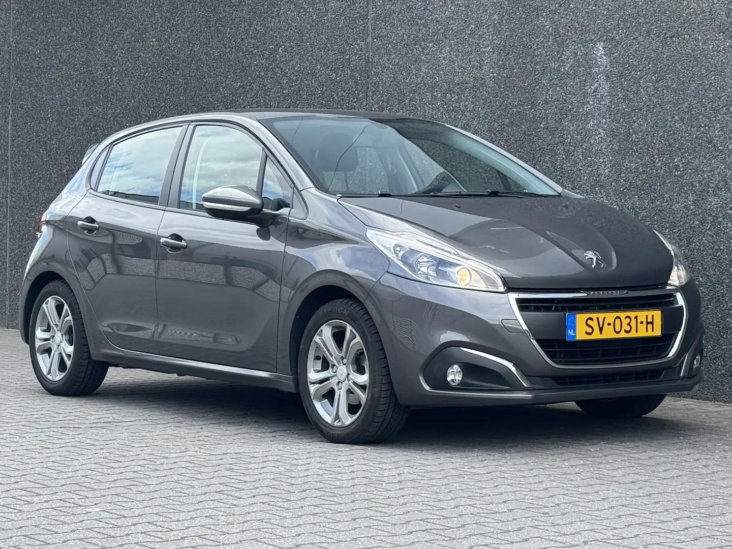 Peugeot 208 1.2 PureT. Blue Lion Grijs - 1