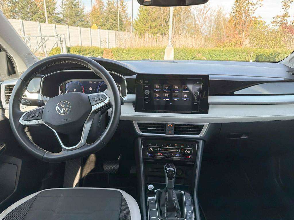 used 2025 Volkswagen Taos car, priced at $28,638
