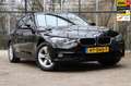 BMW 320 3-serie 320i Essential / NL-auto / Navi+PDC / Rijk Noir - thumbnail 1