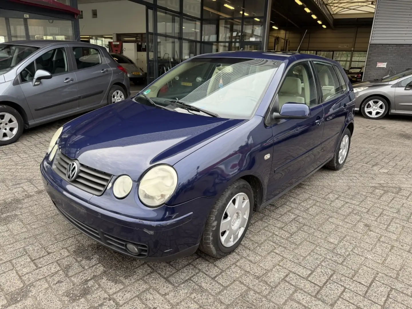 Volkswagen Polo 1.4-16V Highline Blauw - 1