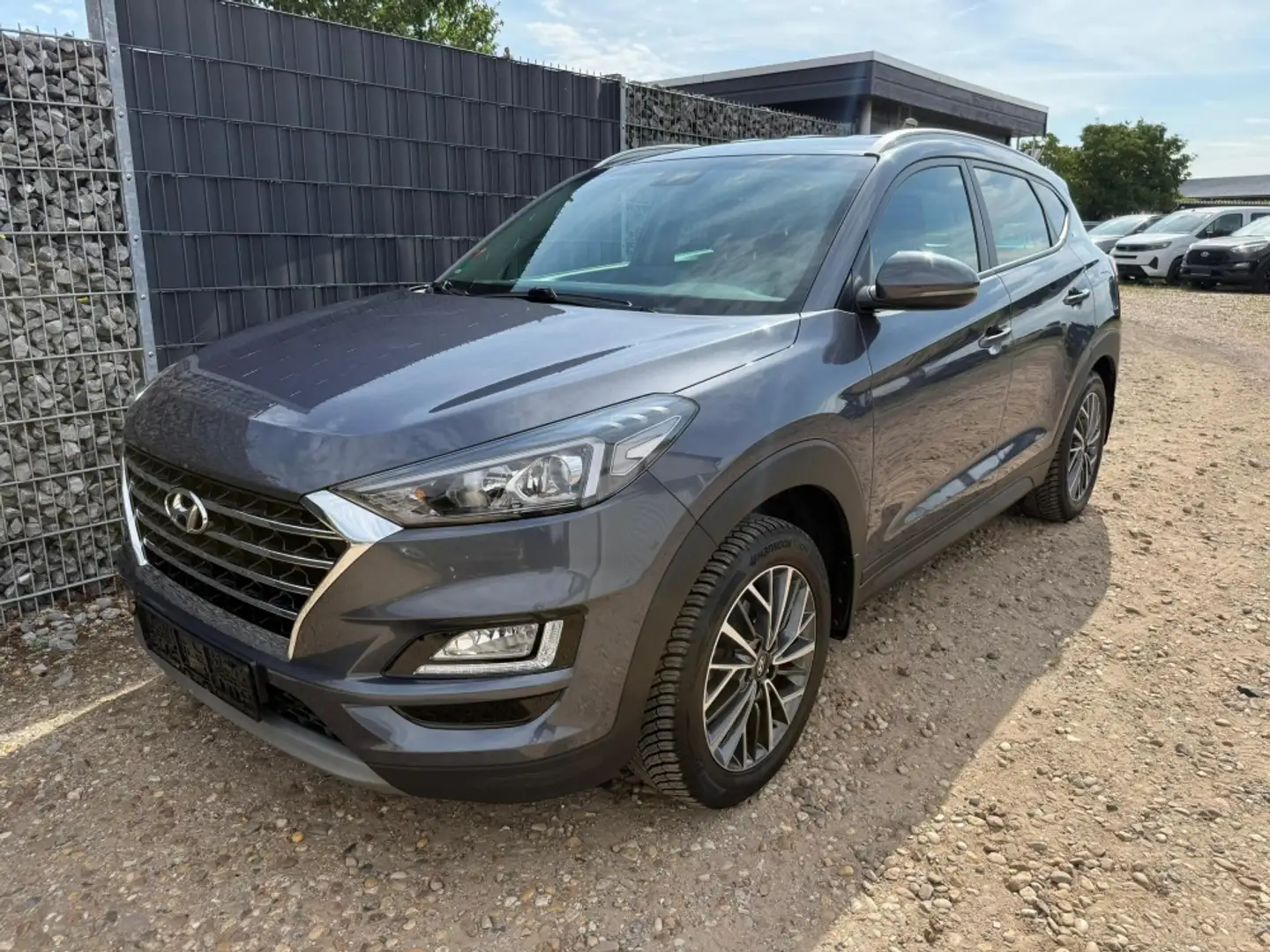 Hyundai TUCSON 1.6 T-GDI Navi SHZ AHK 18" Allwetter Gris - 1