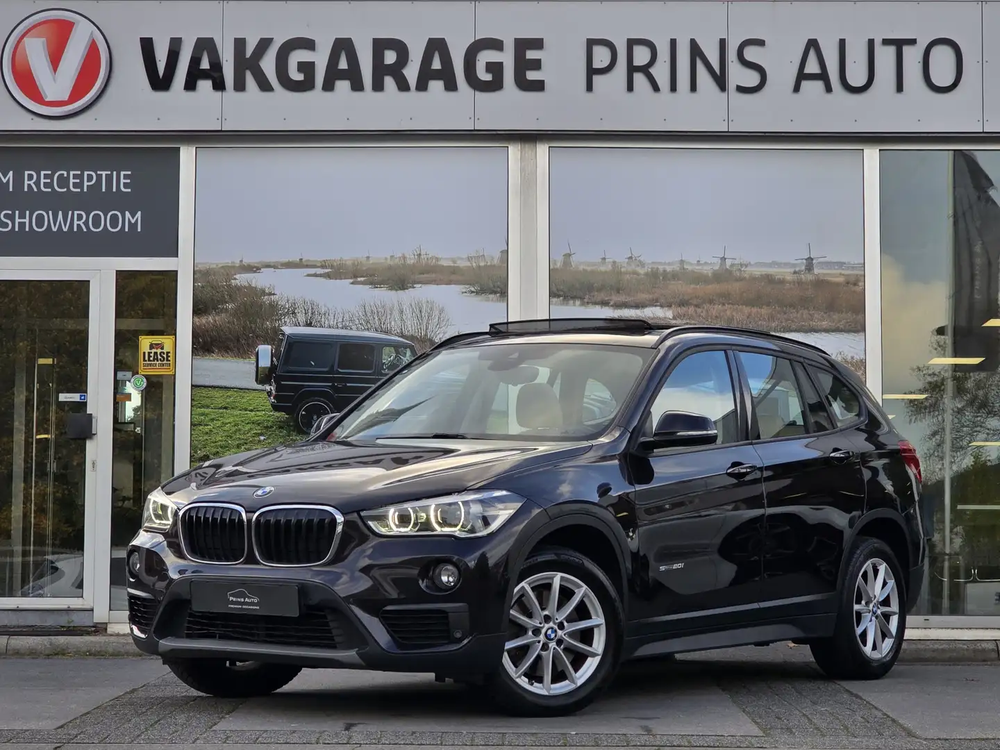 BMW X1 sDrive20i Centennial High Executive |PANO|STOELVW| Brown - 1