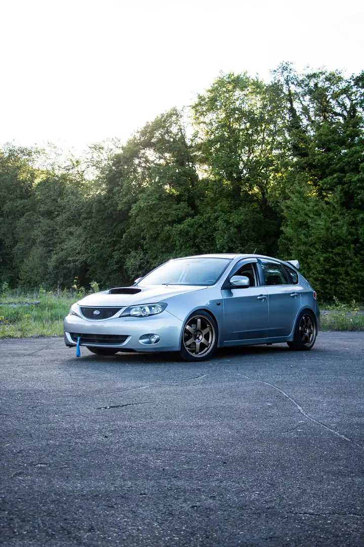 Subaru Impreza 2.0R Luxury AWD Grijs - 1