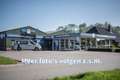 Toyota Corolla Touring Sports 1.8 Hybrid Business Plus Zwart - thumbnail 1