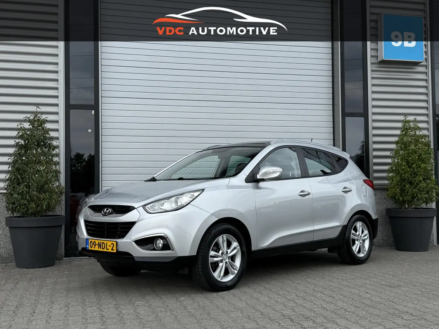 Hyundai iX35 2.0i i-Catcher Pano | Trekhaak | Keyless | Leder | Gris - 1