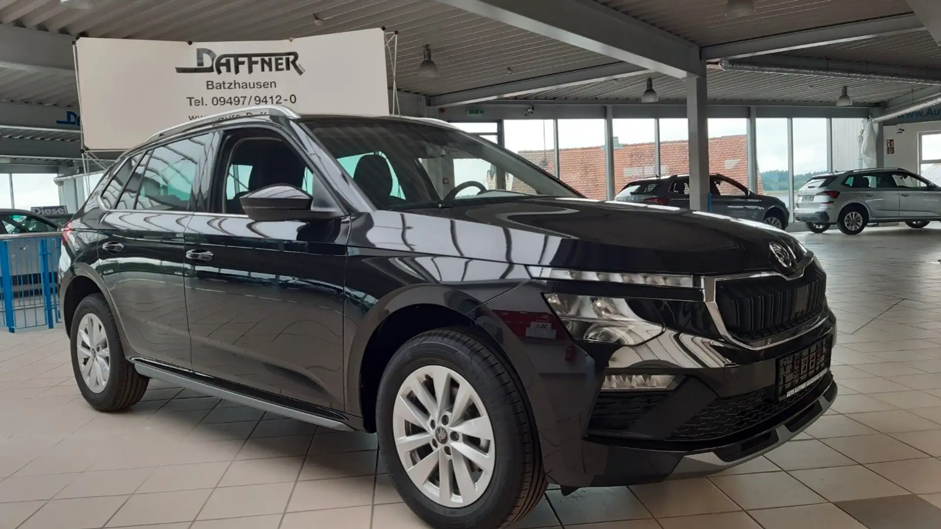 Skoda Kamiq 1.0 TSI 85kW / SZHZG / DAB / PDC / AHK Noir - 1