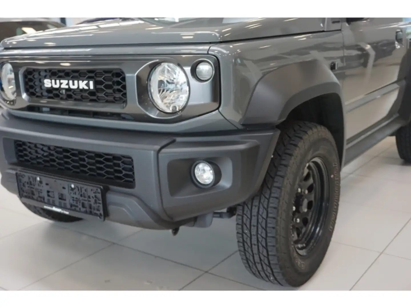 Suzuki Jimny 1.5 Comfort Allgrip NFZ Klima eFH ZV DAB BT Grijs - 2