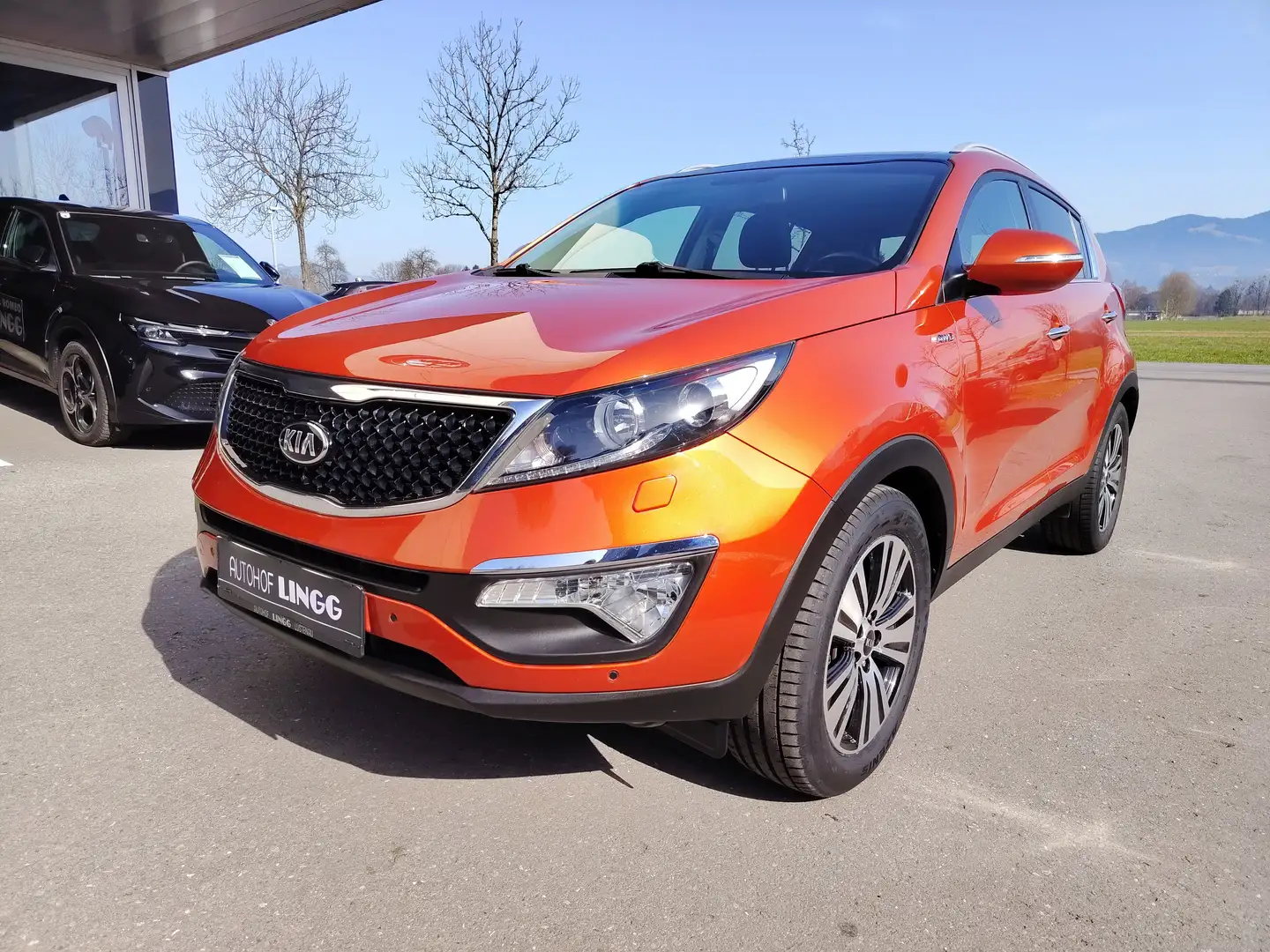 Kia Sportage 2,2 CRDi AWD Aut. Platin Orange - 1