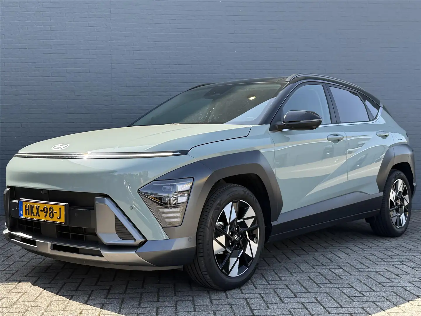 Hyundai KONA 1.6 GDI HEV 141pk DCT Premium Sky | stoel & stuur Groen - 2