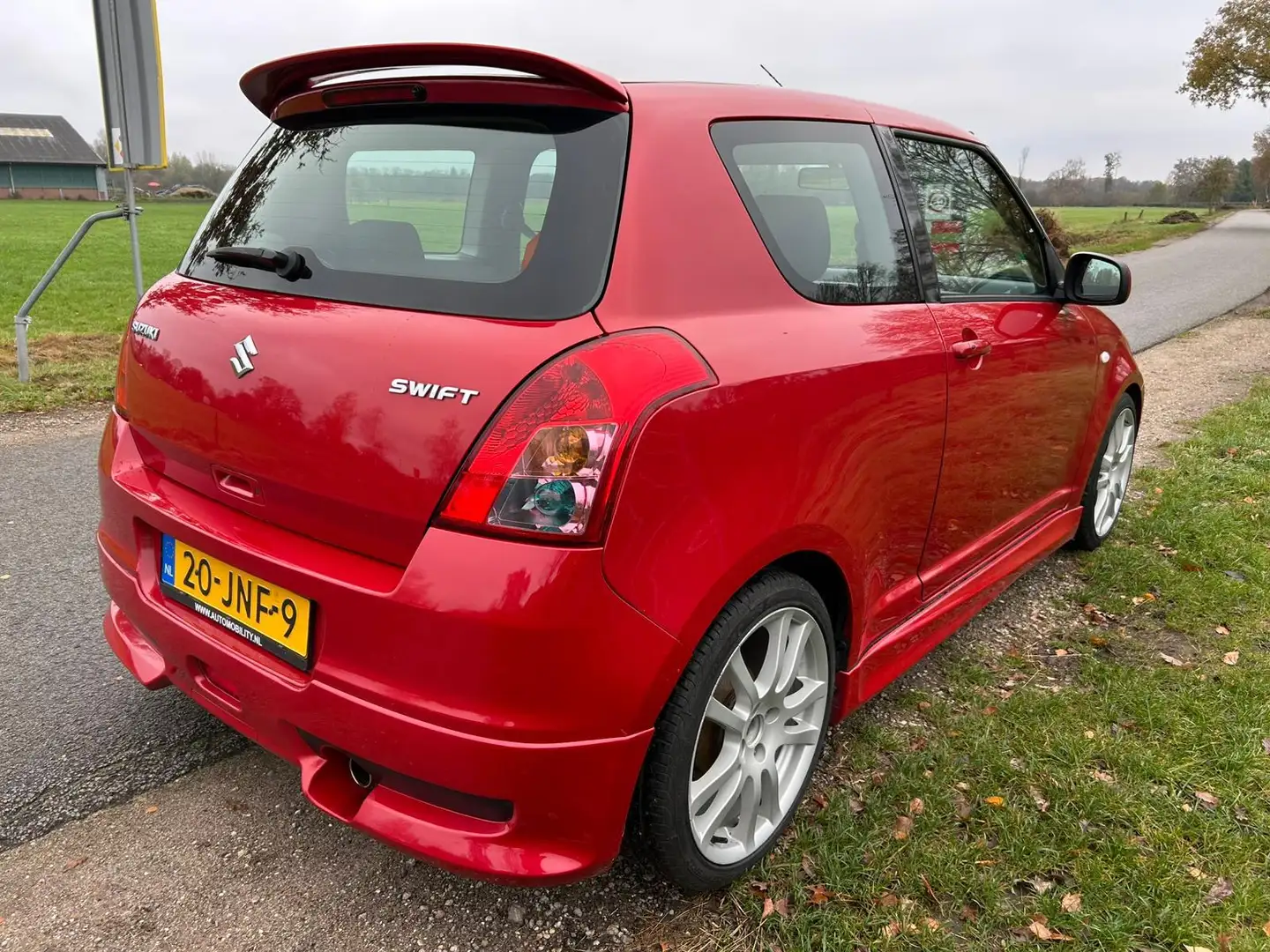 Suzuki Swift 1.5 Exclusive perfect onderh. sportpakket Rouge - 2
