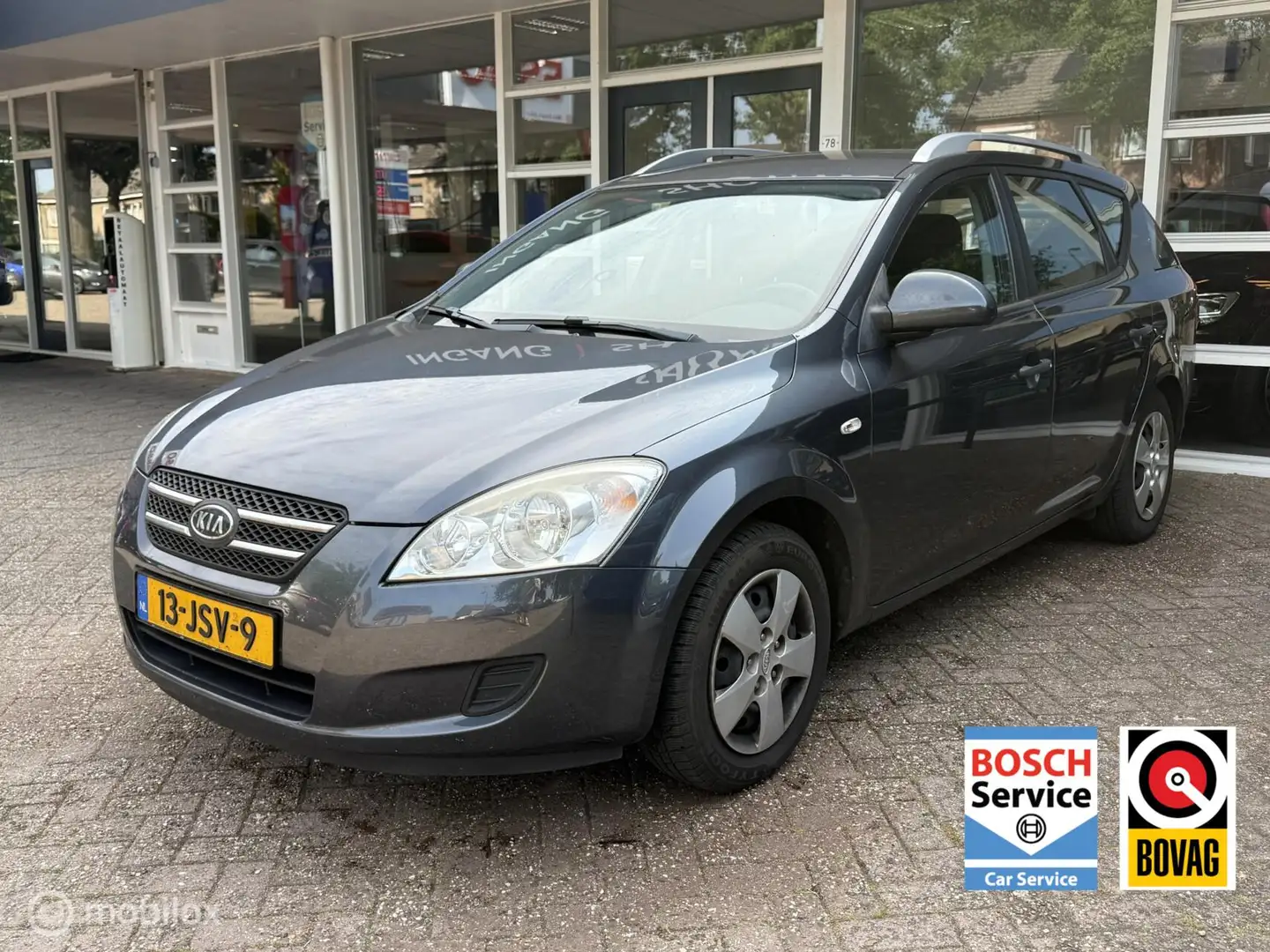 Kia Ceed / cee'd Sporty Wagon 1.4 X-ecutive ISG Airco! Grijs - 1