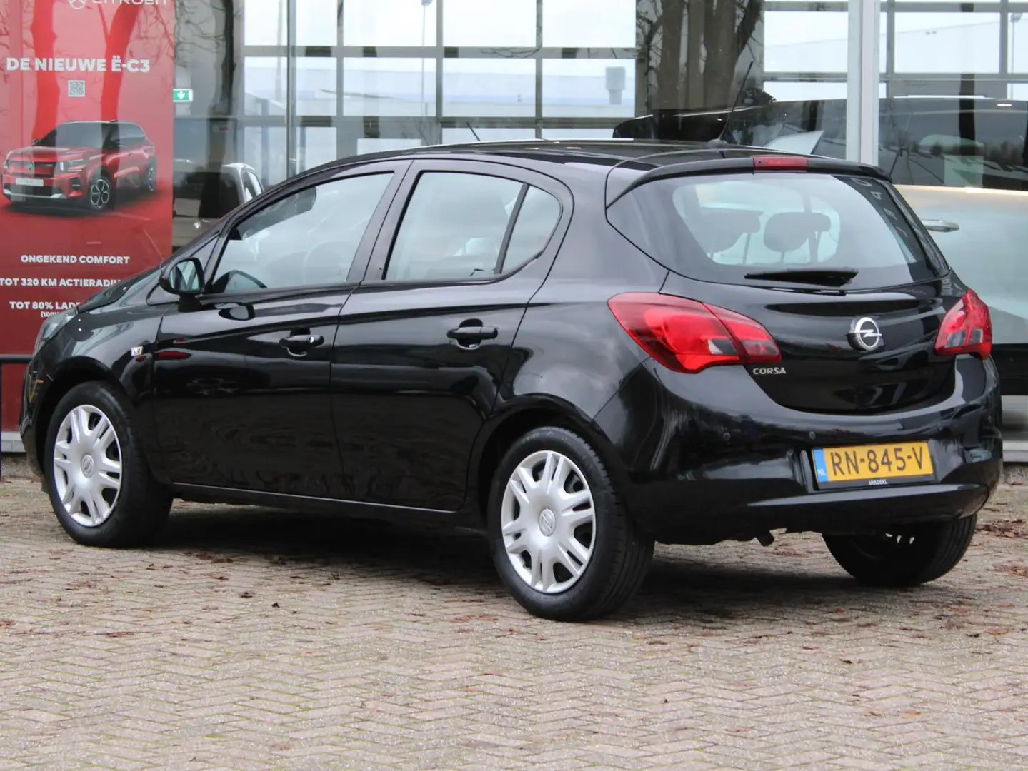 Opel Corsa 1.4 Favourite | Cruise / Parkeersensoren / Airco Schwarz - 2