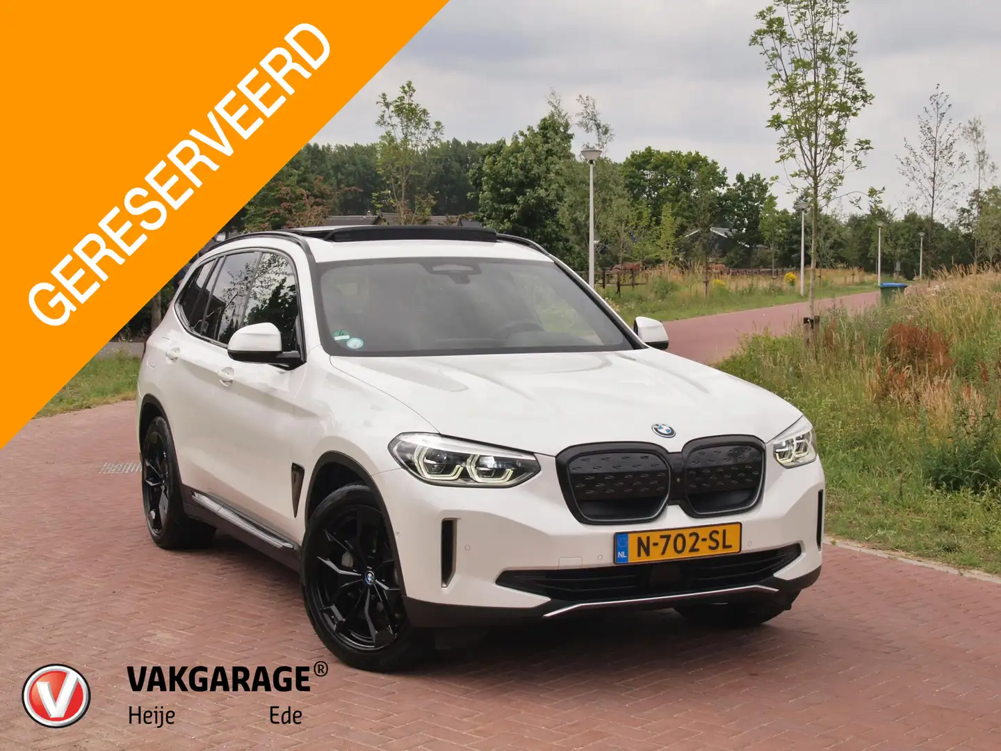 BMW iX3 High Executive 80 kWh | Panoramadak | Trekhaak | N Bílá - 1