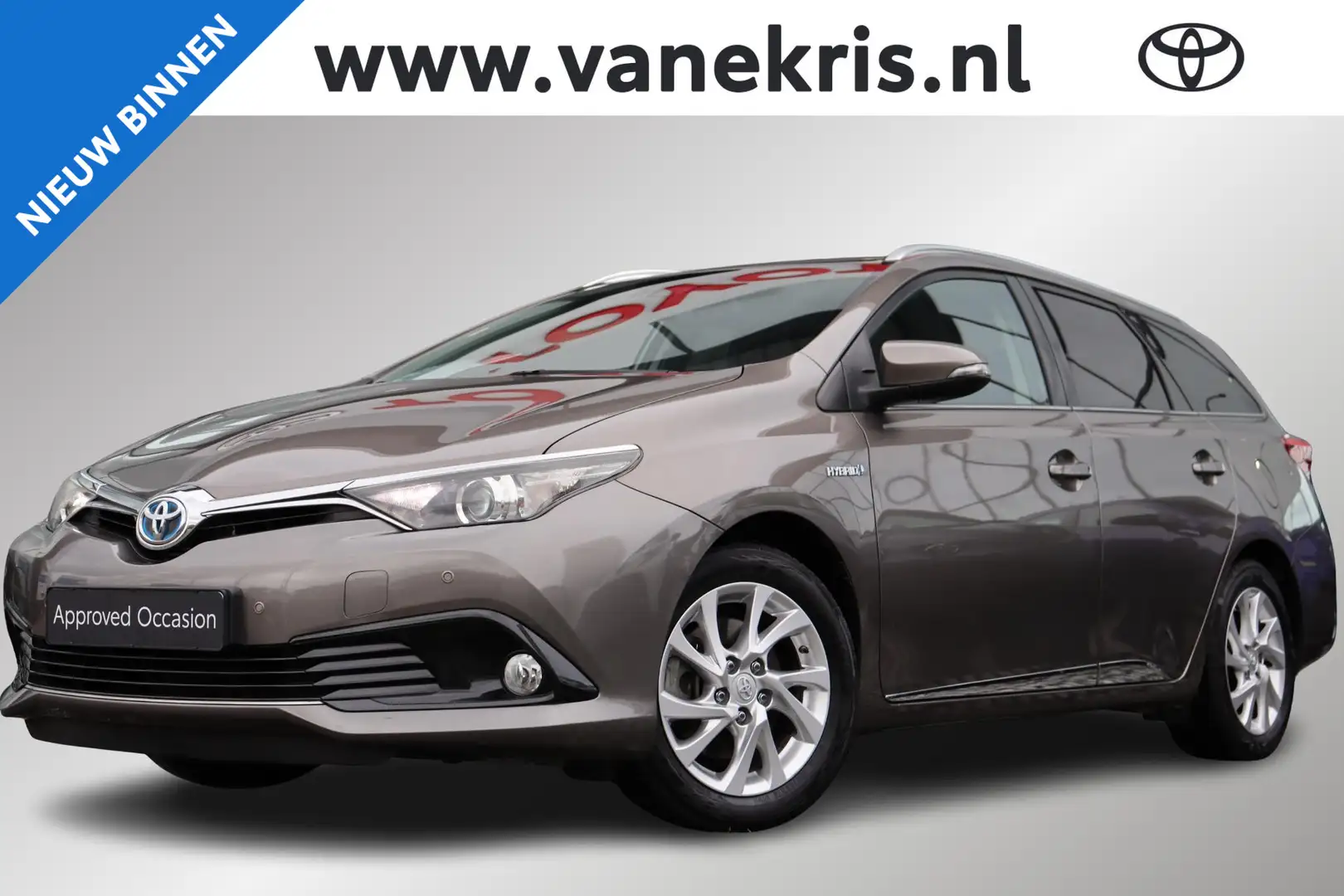 Toyota Auris Touring Sports 1.8 Hybrid Dynamic Go Trekhaak, Par Gris - 1