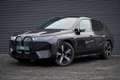 BMW iX xDrive40 Excellence 77 kWh / M-Sportpakket / Pano Grijs - thumbnail 1