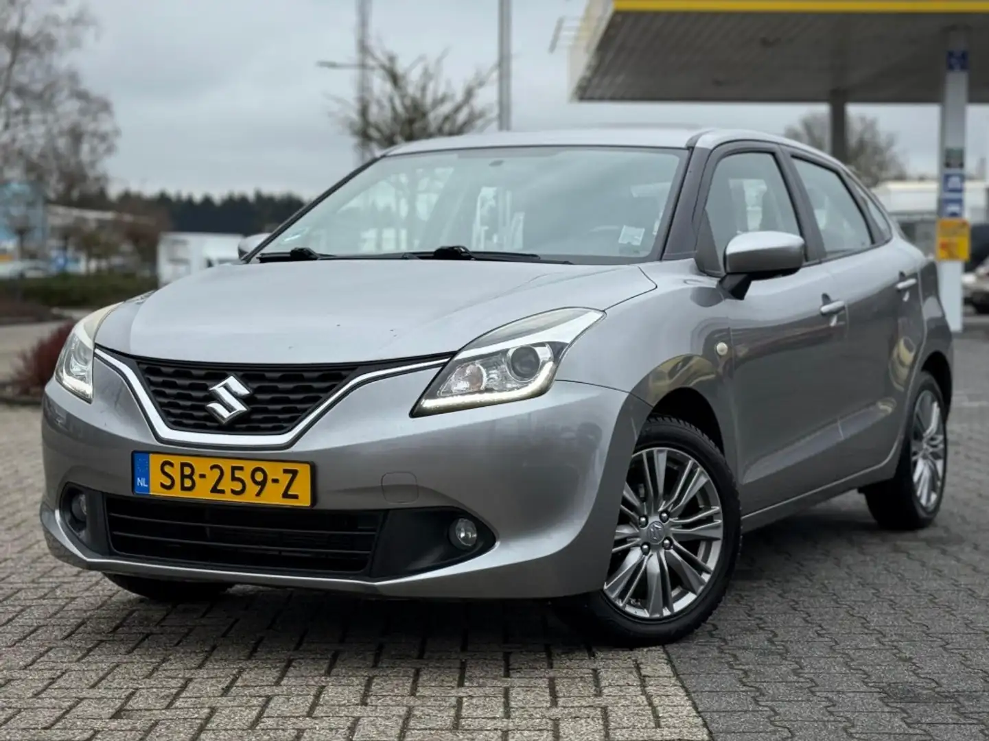 Suzuki Baleno 1.2 EXCLUSIVE AIRCO BLUETOOTH Grau - 1