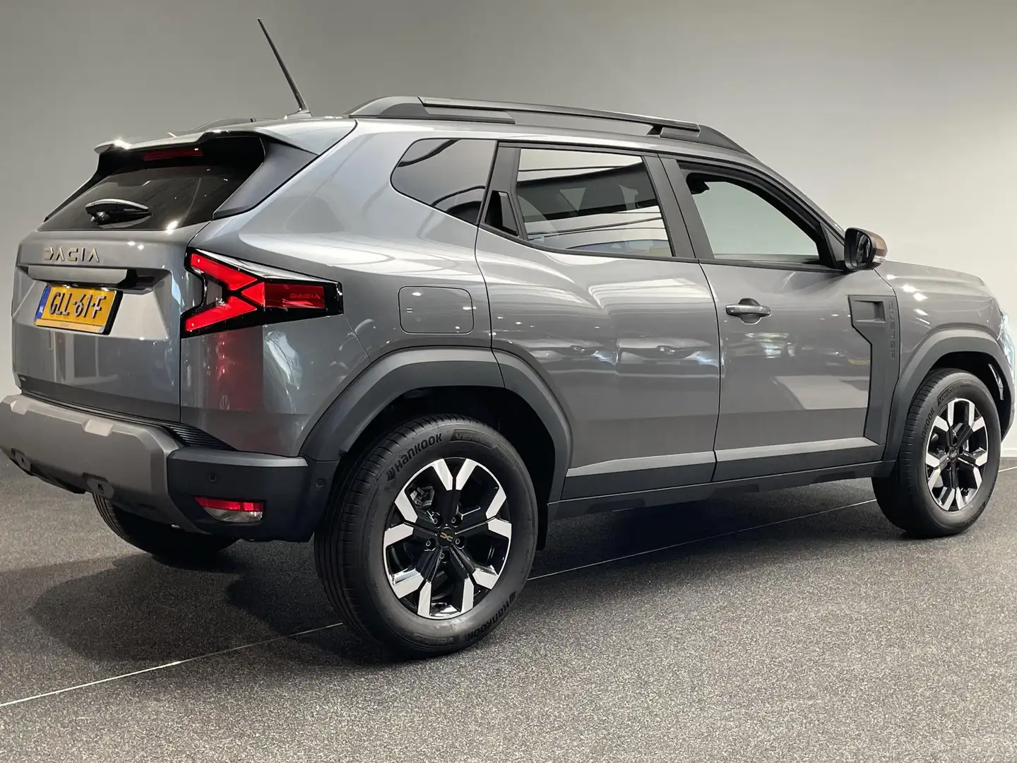 Dacia Duster 1.6 Hybrid 140 Extreme | Navigatie | 360° Rondomzi Grijs - 2