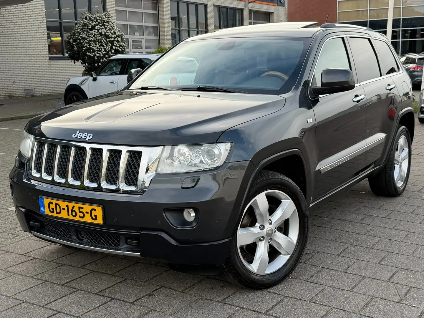 Jeep Grand Cherokee 3.6 Overland l PANO l ONDERHOUDSHISTORIE Schwarz - 1