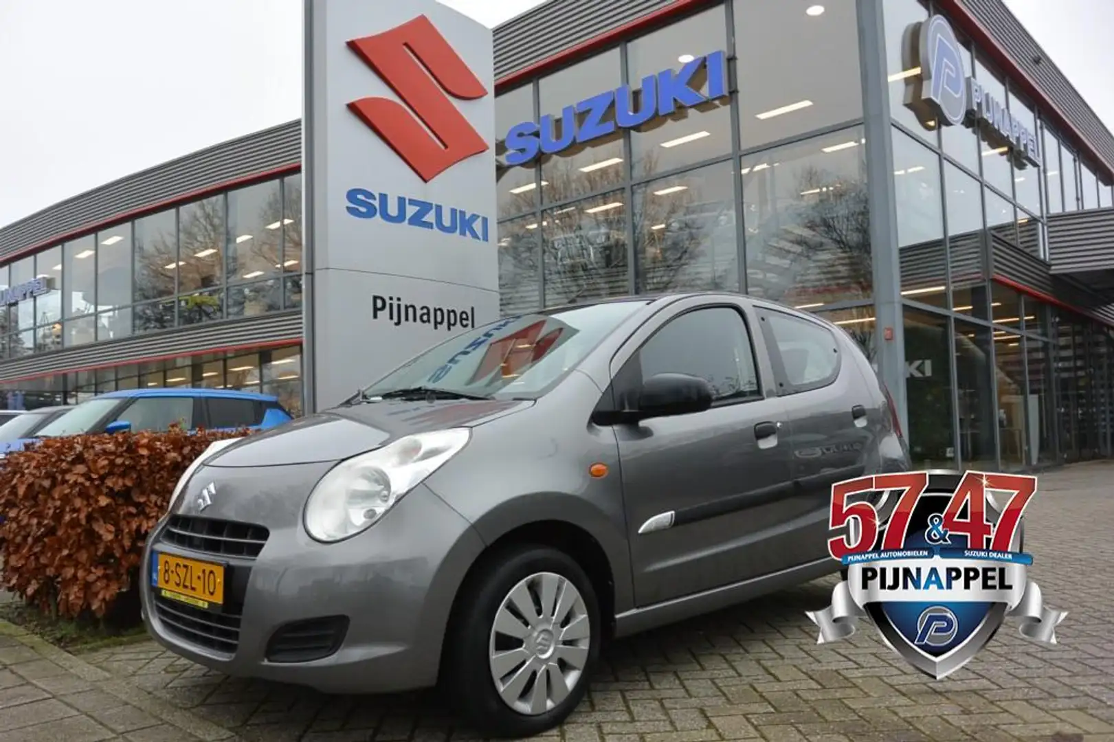 Suzuki Alto 1.0 Comfort Airco 5-deurs / Navigatie* Grau - 1