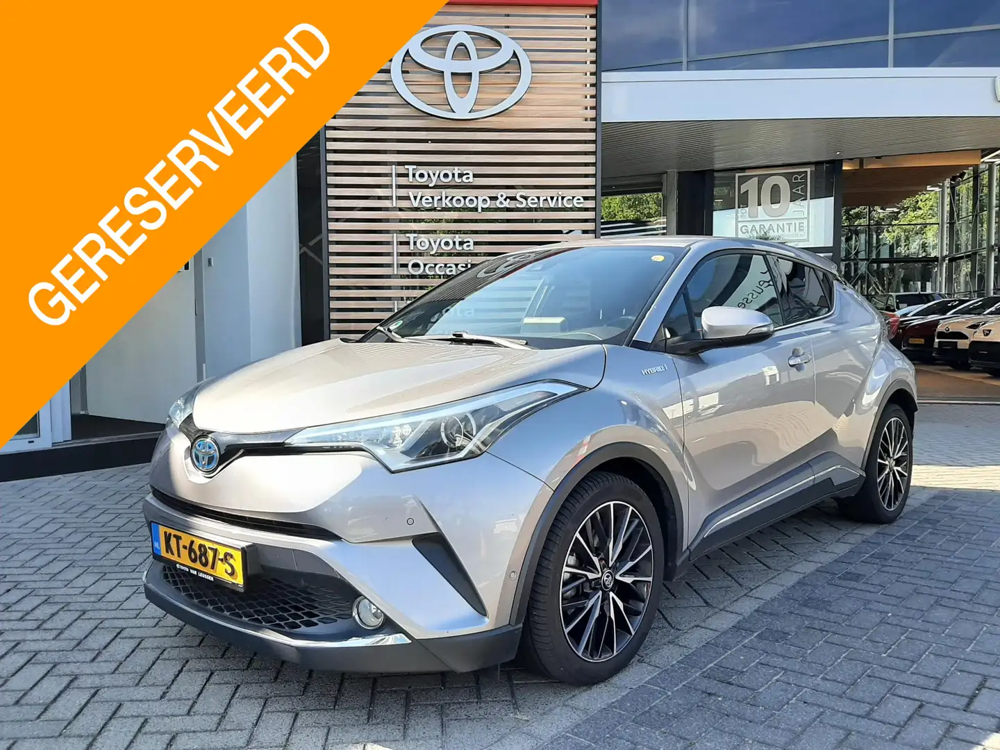 Toyota C-HR 1.8 HYBRID FIRST EDITION JBL-AUDIO STOELVERW NAVI Grau - 1