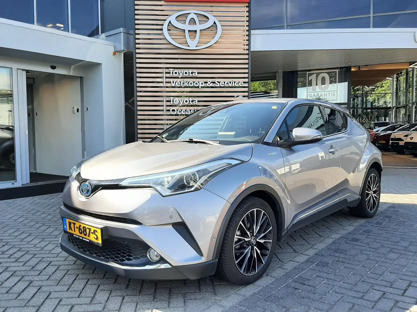 Toyota C-HR 1.8 HYBRID FIRST EDITION JBL-AUDIO STOELVERW NAVI Gris - 1
