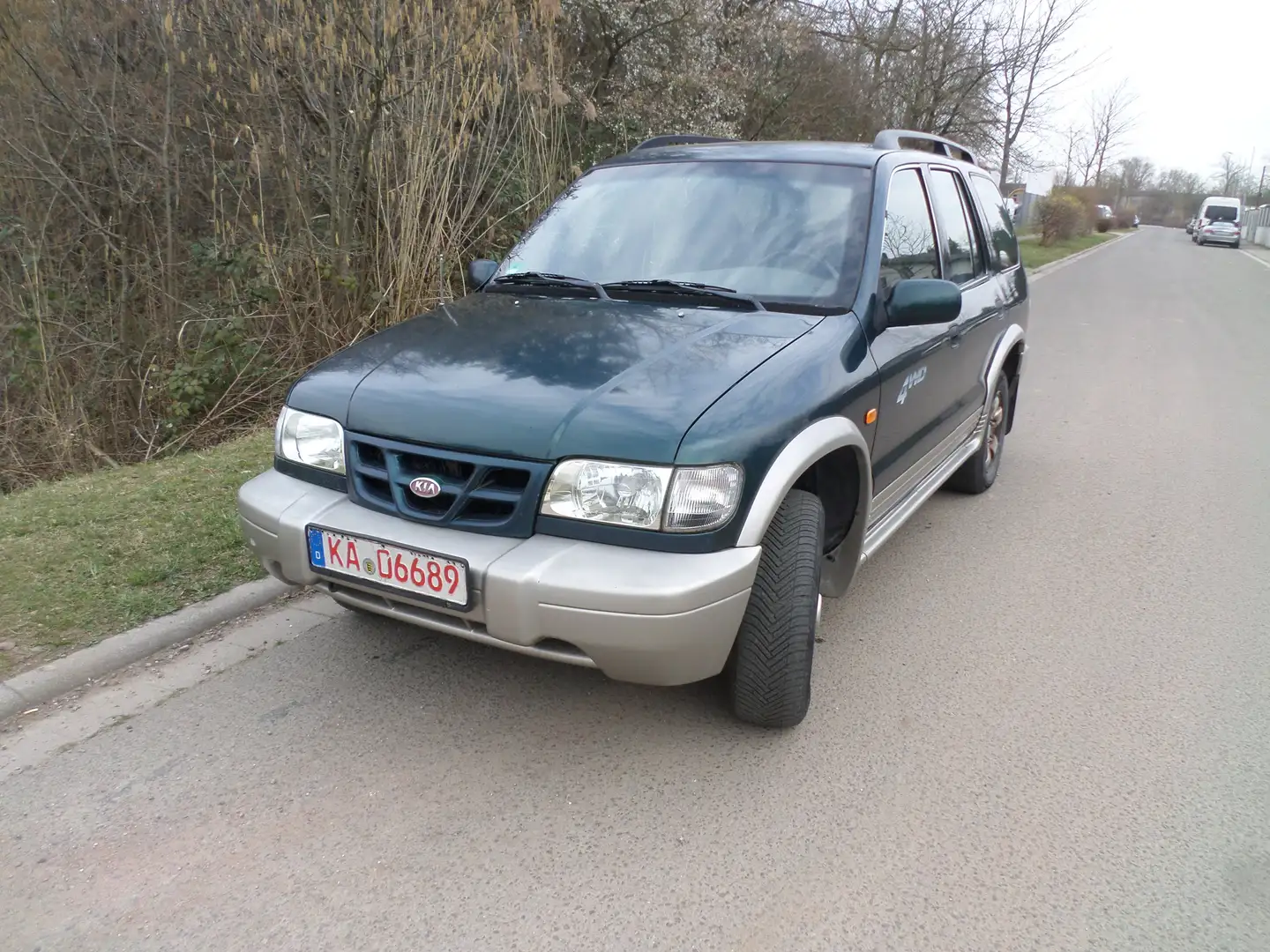 Kia Sportage 16V Grün - 1