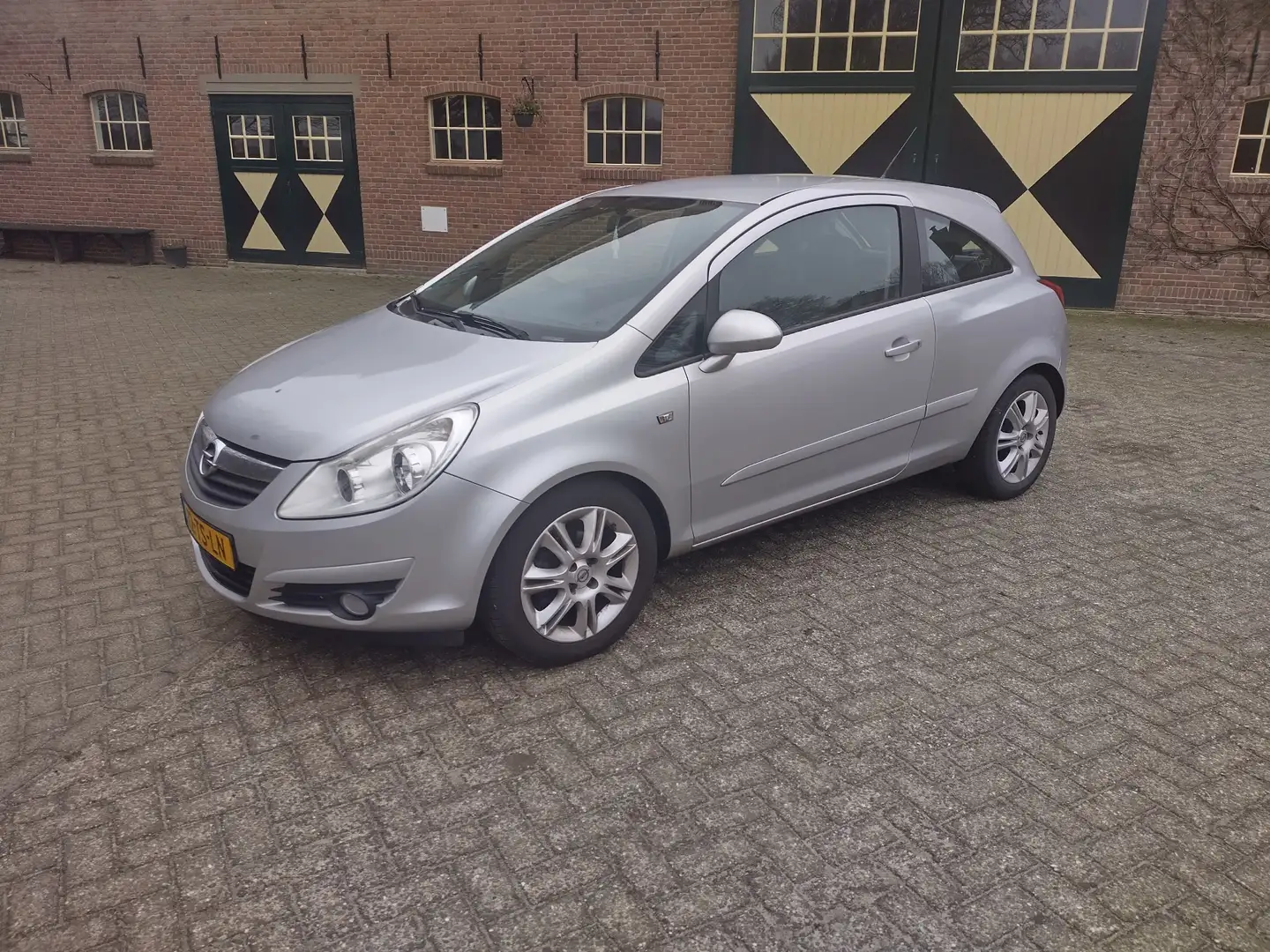 Opel Corsa 1.2-16V Cosmo Grijs - 1