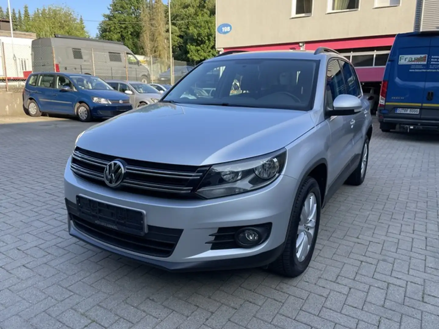 Volkswagen Tiguan 1.4 TSI BlueMot Tech Sport & Style Zilver - 1