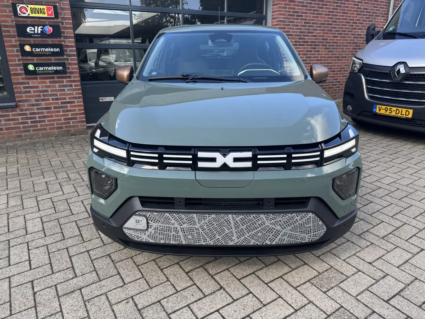 Dacia Spring Extreme 65 26.8 kWh PDC voor en achter ,camera ach Groen - 2