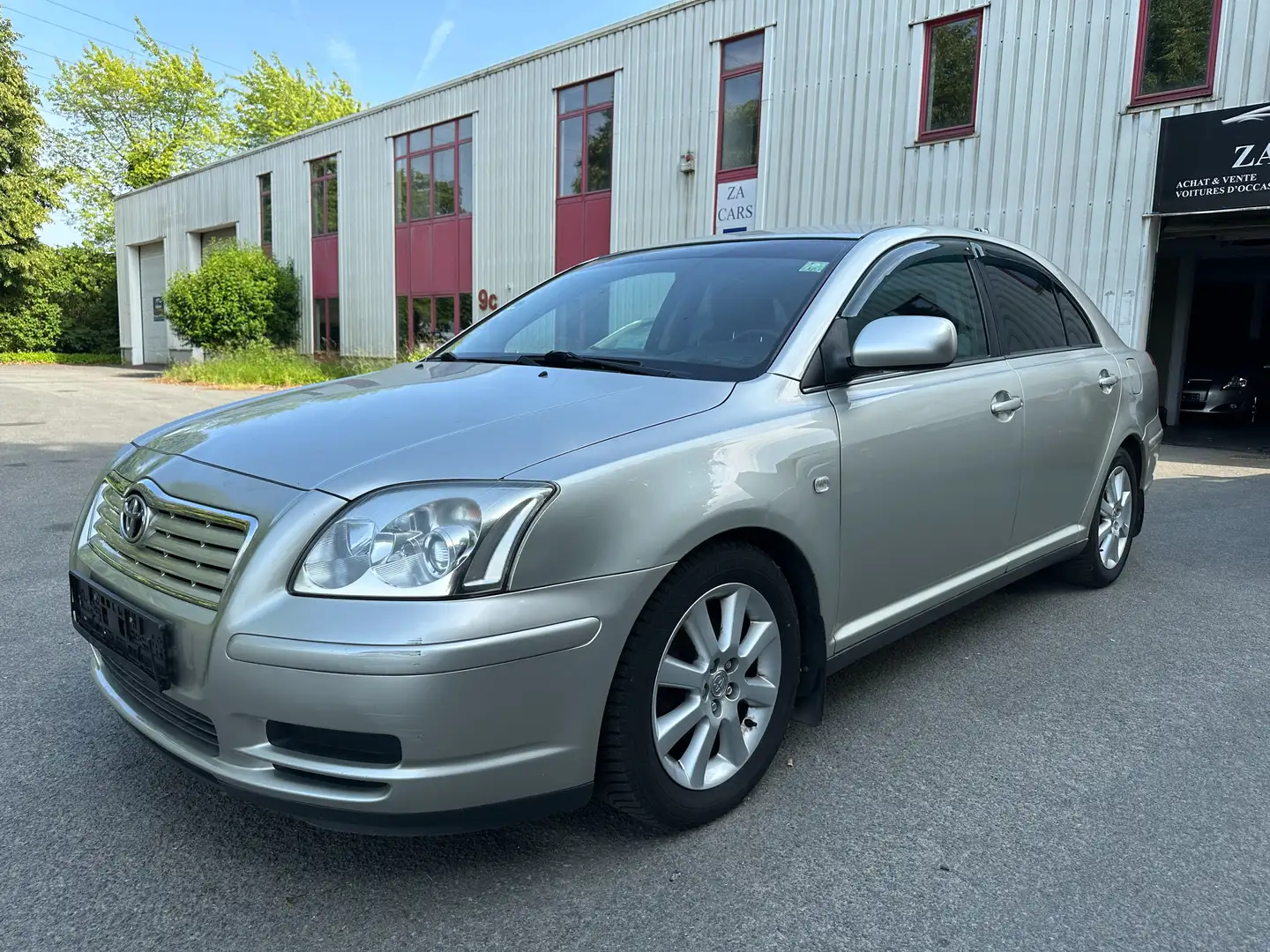 Toyota Avensis 1.8i VVT-i 16v Linea Luna Grijs - 1