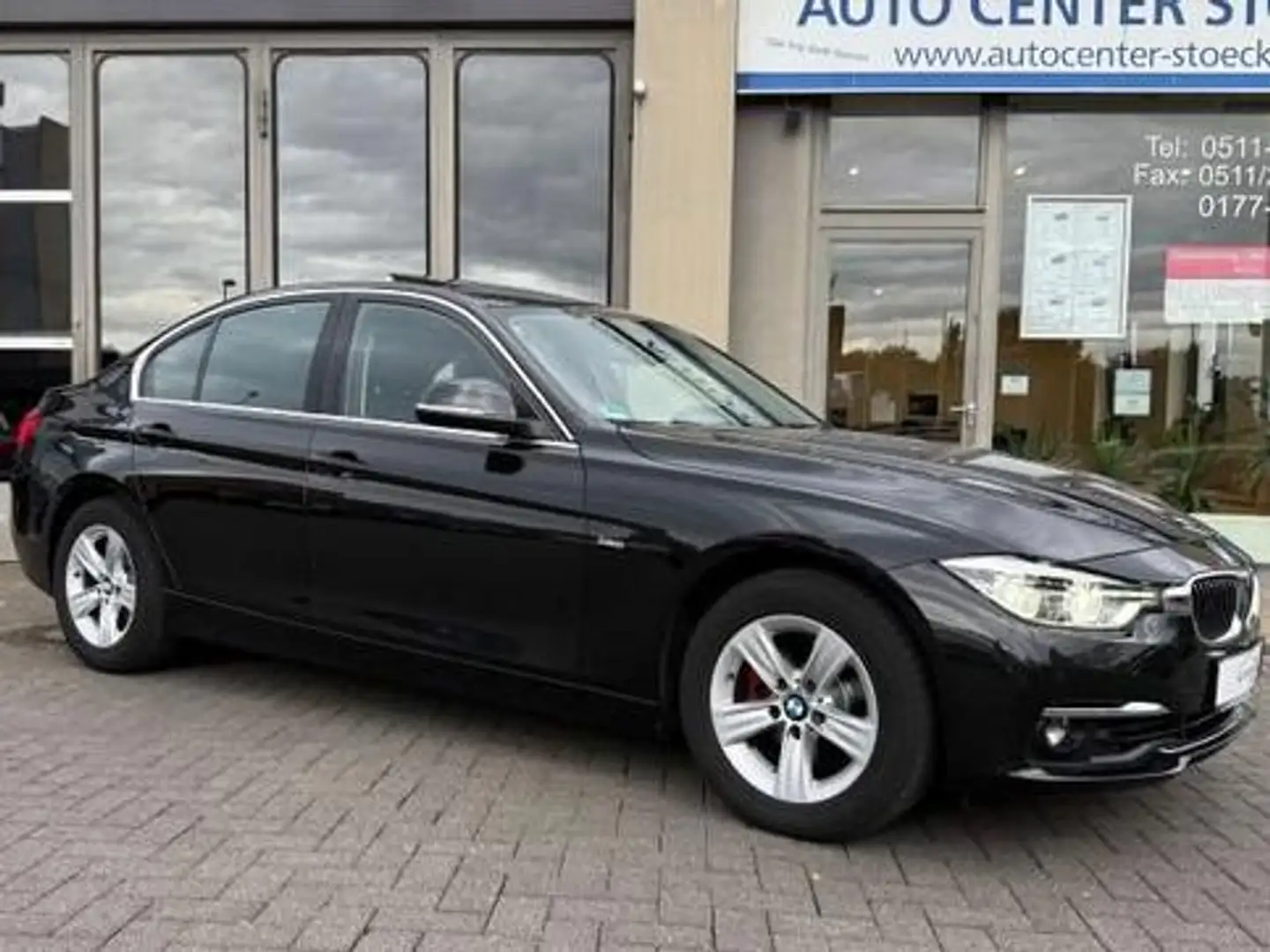 BMW 320 320 i Luxury Line Automatik Leder NaviGarantie SSD Schwarz - 1