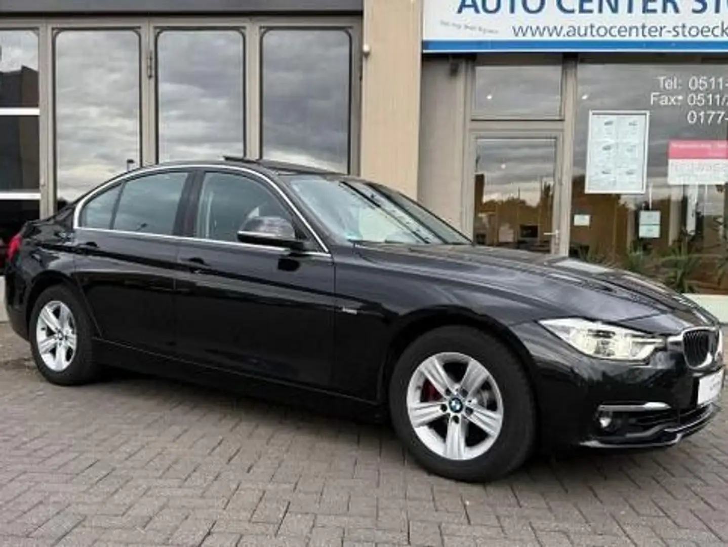BMW 320 320 i Luxury Line Automatik Leder NaviGarantie SSD Schwarz - 2