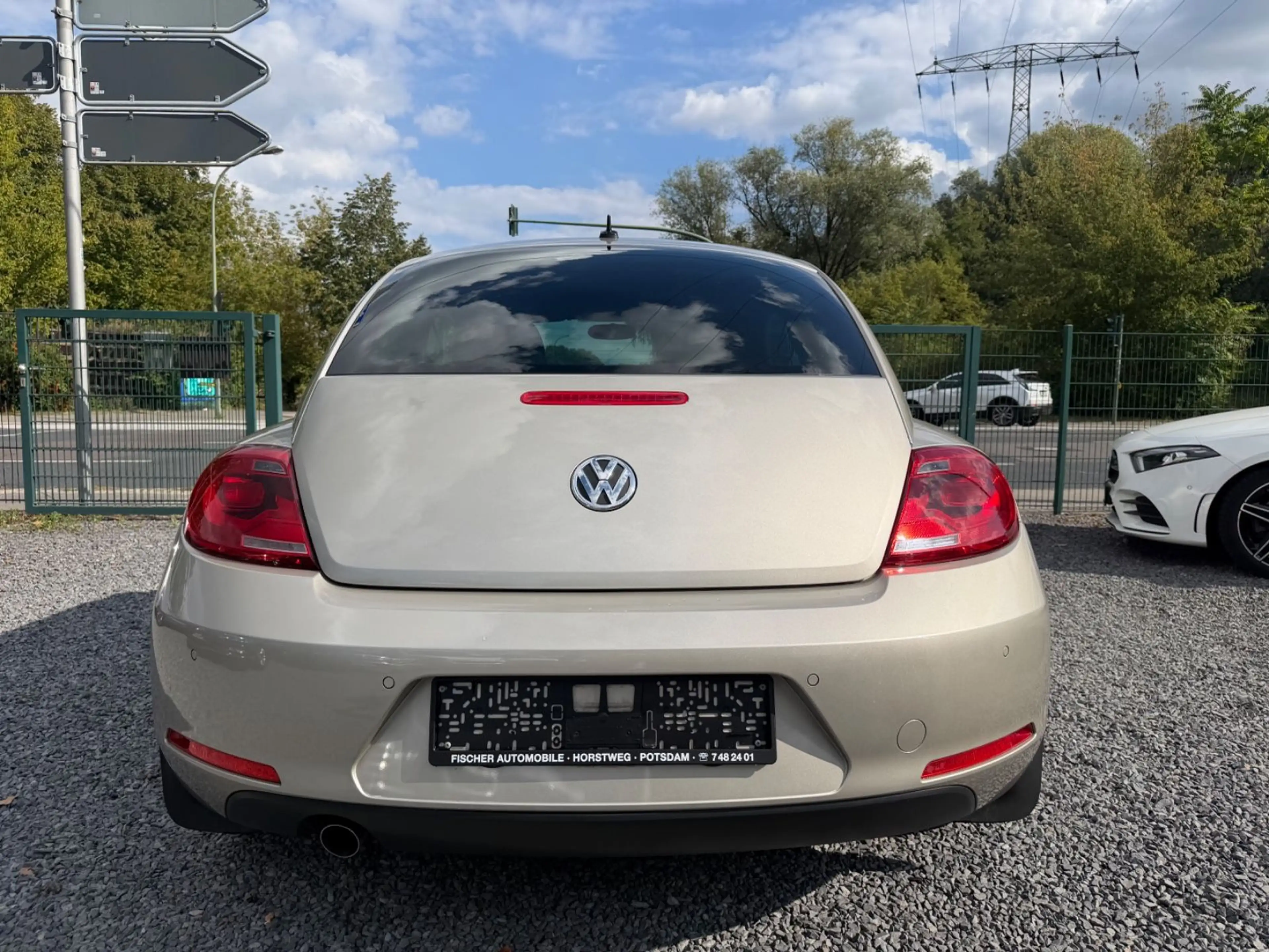 Volkswagen Beetle Lim. Design+KLIMATRONIK+PDC+SITZ.H+ — photo 6