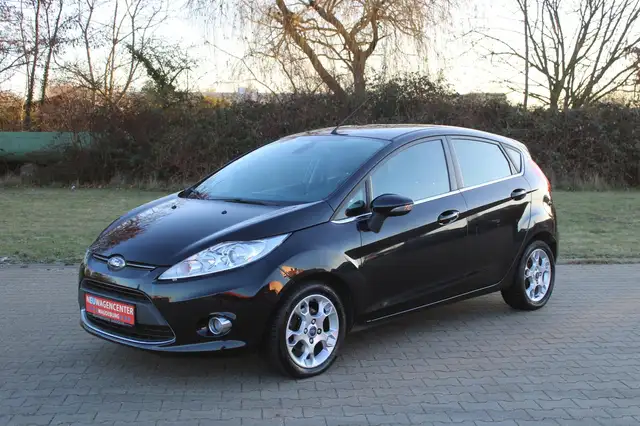 Ford Fiesta 1.25 16V*PDC*SHZ*15"LM*KLIMAAUTOM.*NSW*MFL*TAGFAHR