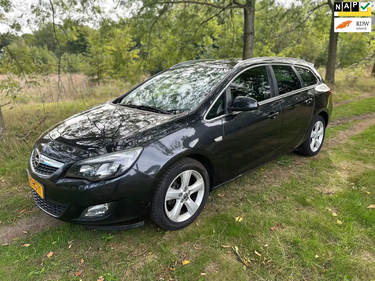 Opel Astra Sports Tourer 1.4 Turbo Sport apk t/m 11-02-2026 Zwart - 1