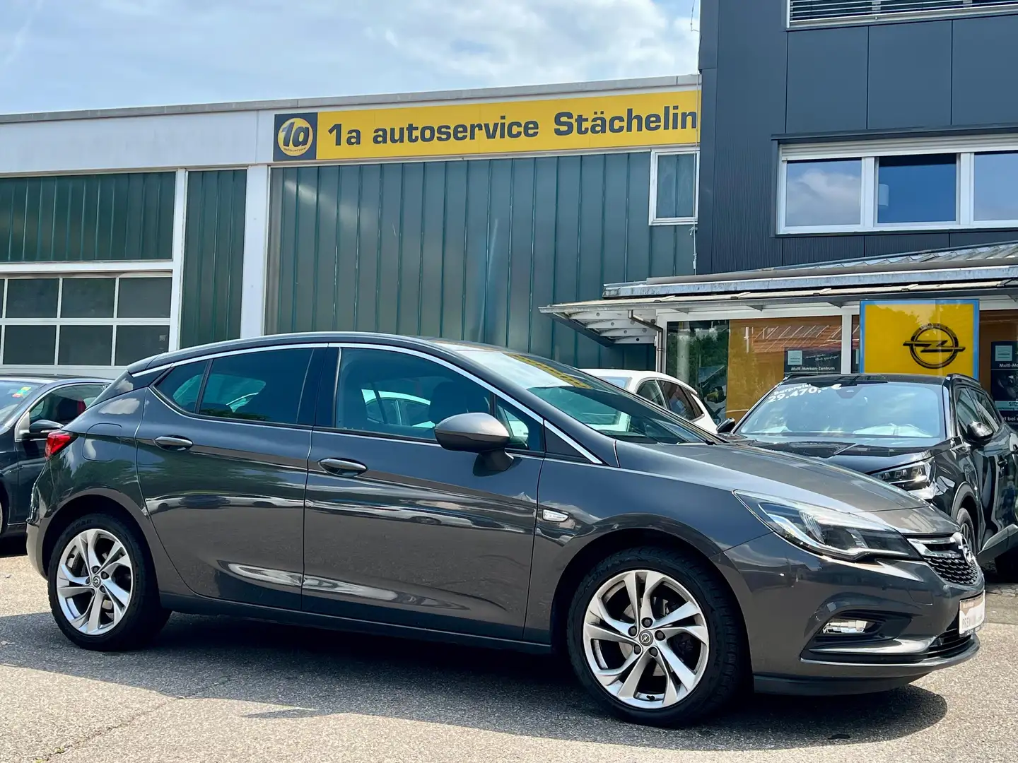 Opel Astra K 1.4T Dynamic,S&LHZ,RKAM,NAVI,KLIMAAT,ALU Gris - 1