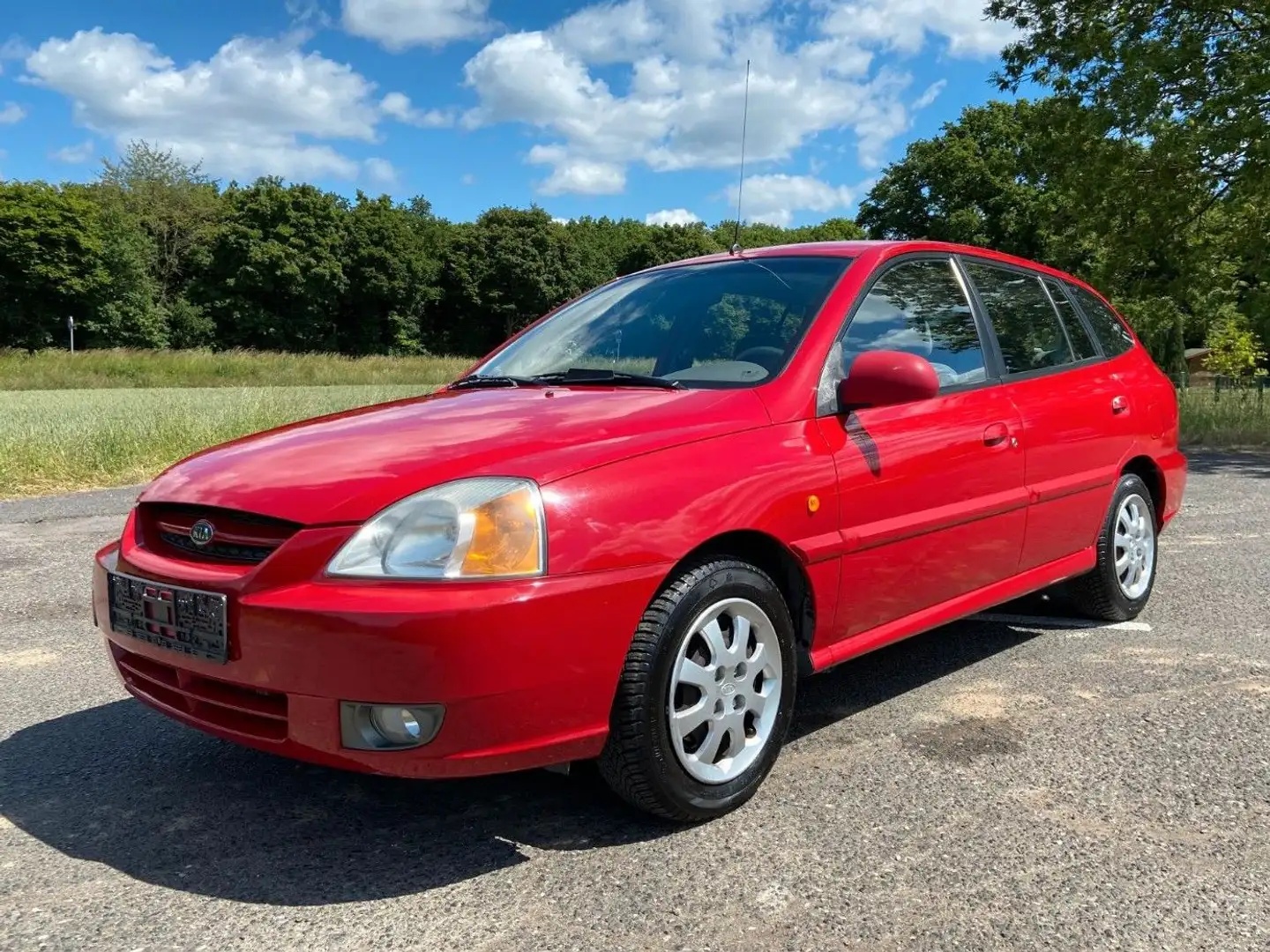 Kia Rio LS 1,3i Kombi Klima Radio Allwetter Rood - 1