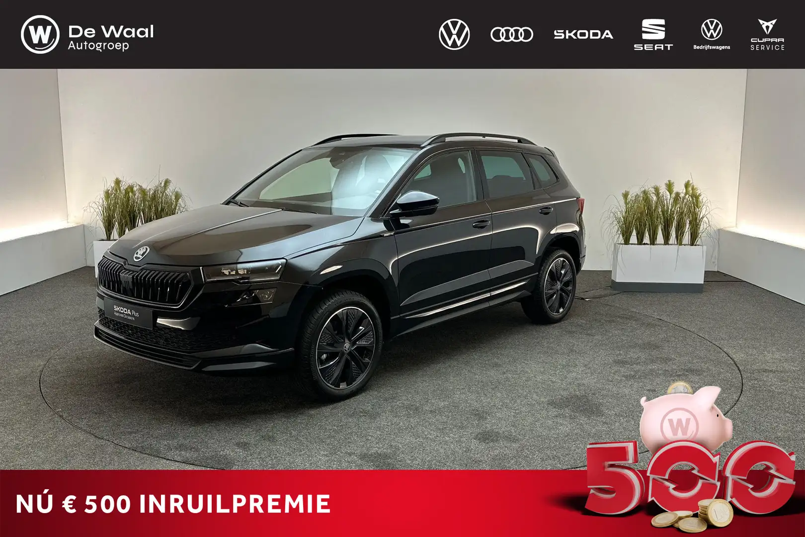 Skoda Karoq 1.5 TSI 150pk DSG ACT Sportline Business | Achteru Schwarz - 1