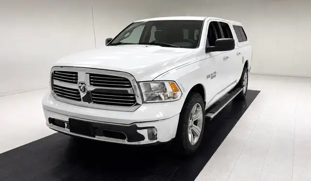 Dodge RAM 1500 Quad Cab 4x4 Longhorn Short Bed Pickup