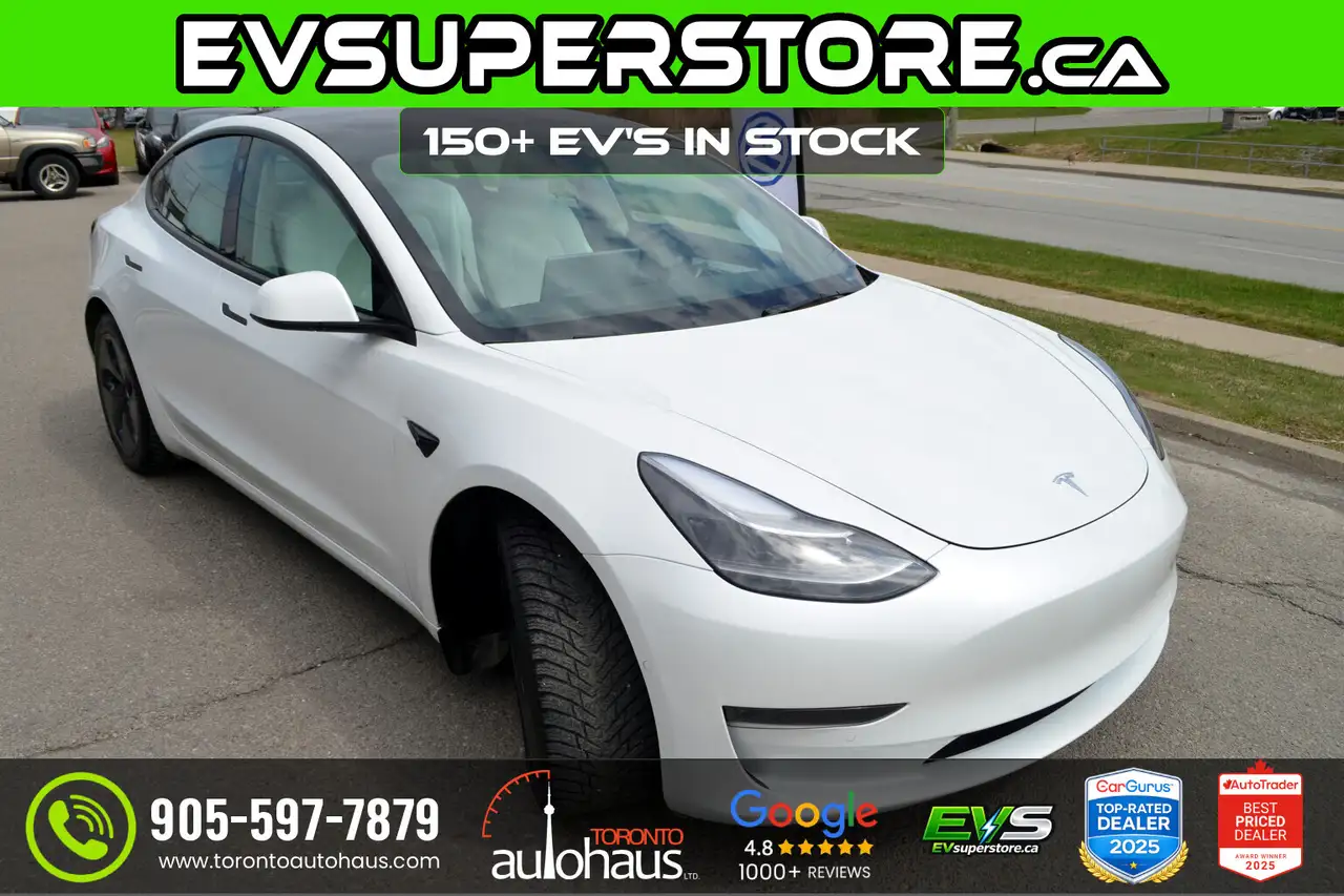 Tesla Model 3 photo Tesla Model 3