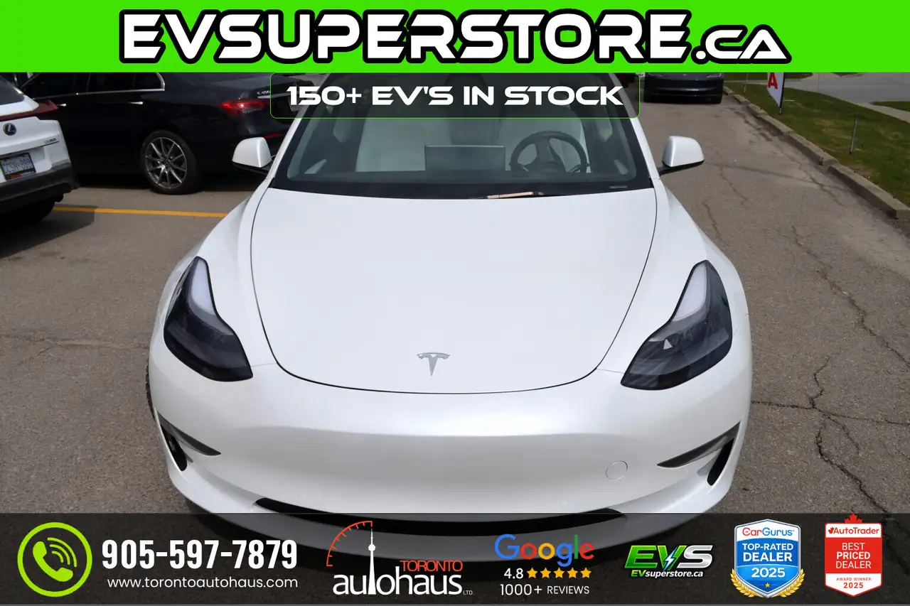 Tesla Model 3 photo Tesla Model 3